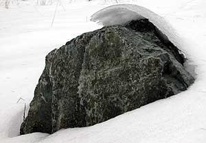 Ice wave over rock